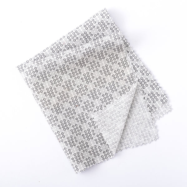 White pocket square with patterned rounds