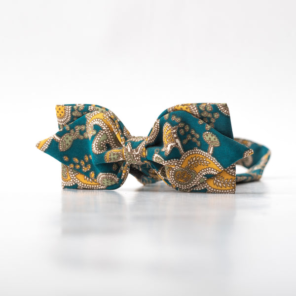 Turquoise Pointed Bow tie with yellow pattern