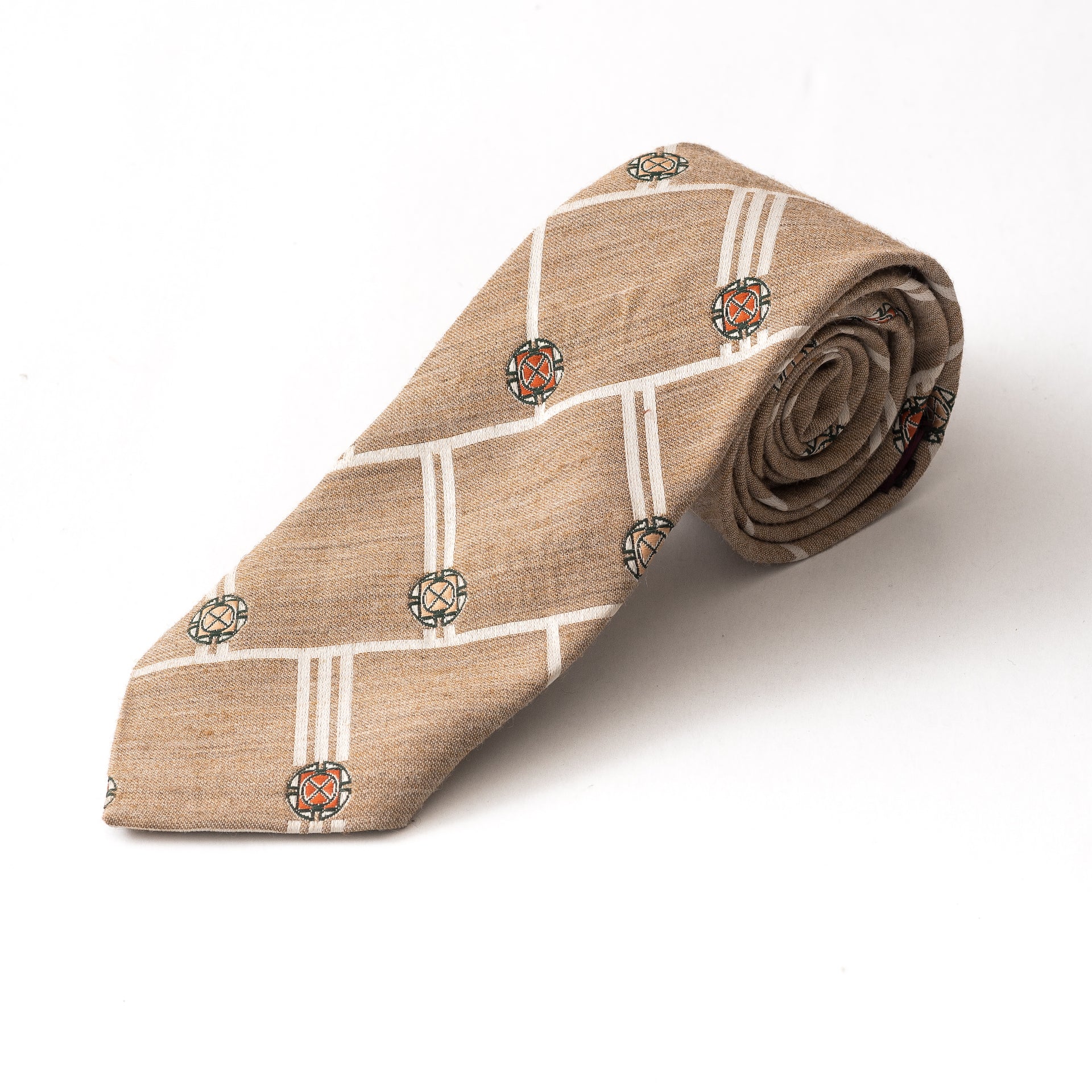 Beige tie with patterns