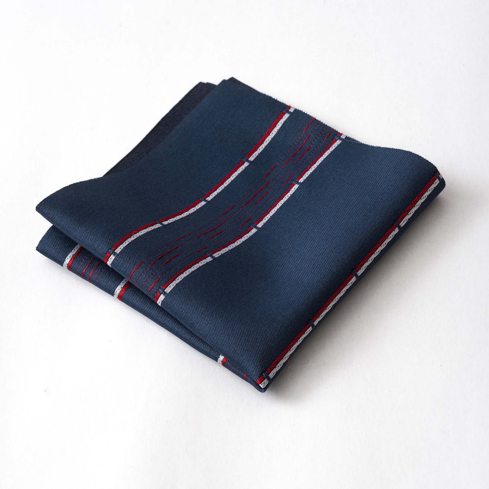 Dark blue pocket square with red and white stripes